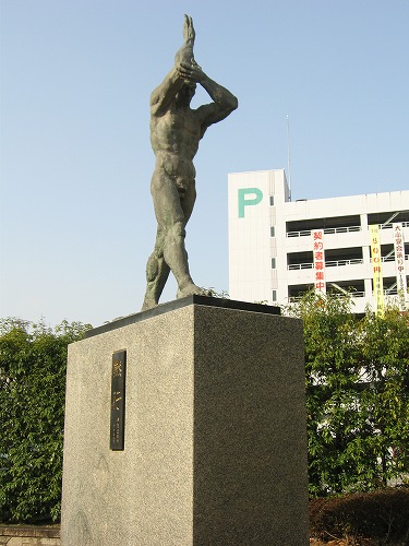 黙行1